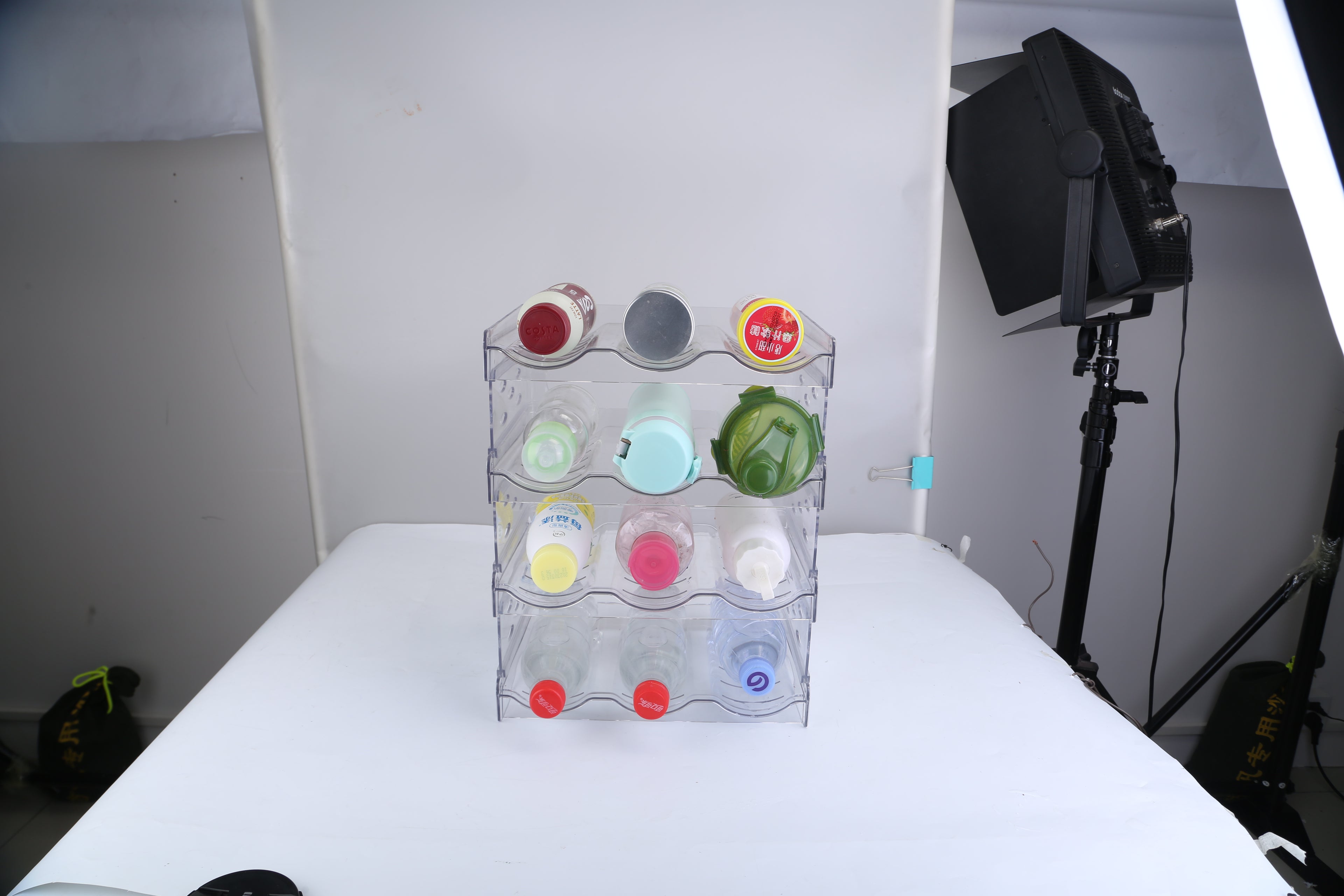 1Pc 4 Tier Bottle Storage Holder 12 Bottles Transparent Stackable Bottle Organizer Standing Drink Holder Shelf For Kitchen Fridge Cabinet Pantry